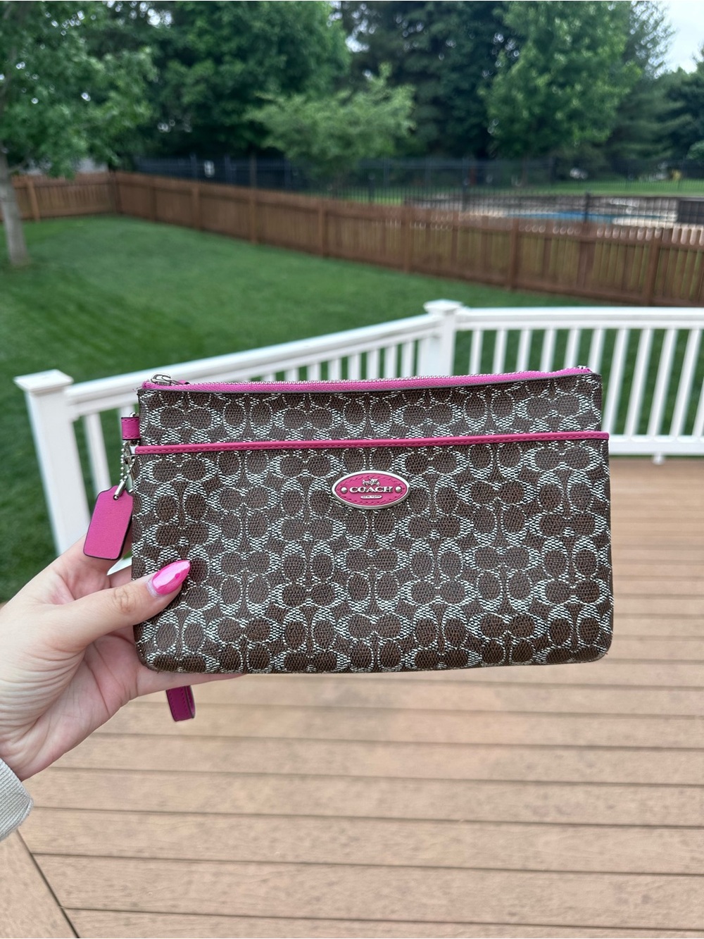 Coach Brown Signature Canvas Wristlet with Pink Trim